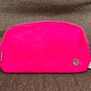 Lululemon Everywhere Belt Bag 1L Sonic Pink. Bought NWT, used once. Mint!